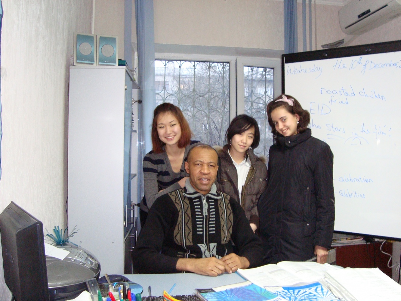 Фото Kingsway.kz - Алматы. A native speaker with some of his students at kingsway.KZ language centre.