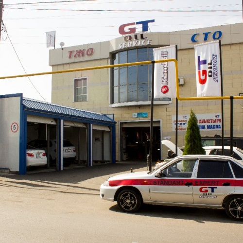 Фото GT oil service Алматы. Главный офис на Тлендиева 377а, имеет 7 ям для замены масла, 4 подьемника, 2 бокса электриков, и геометрический подьемник.